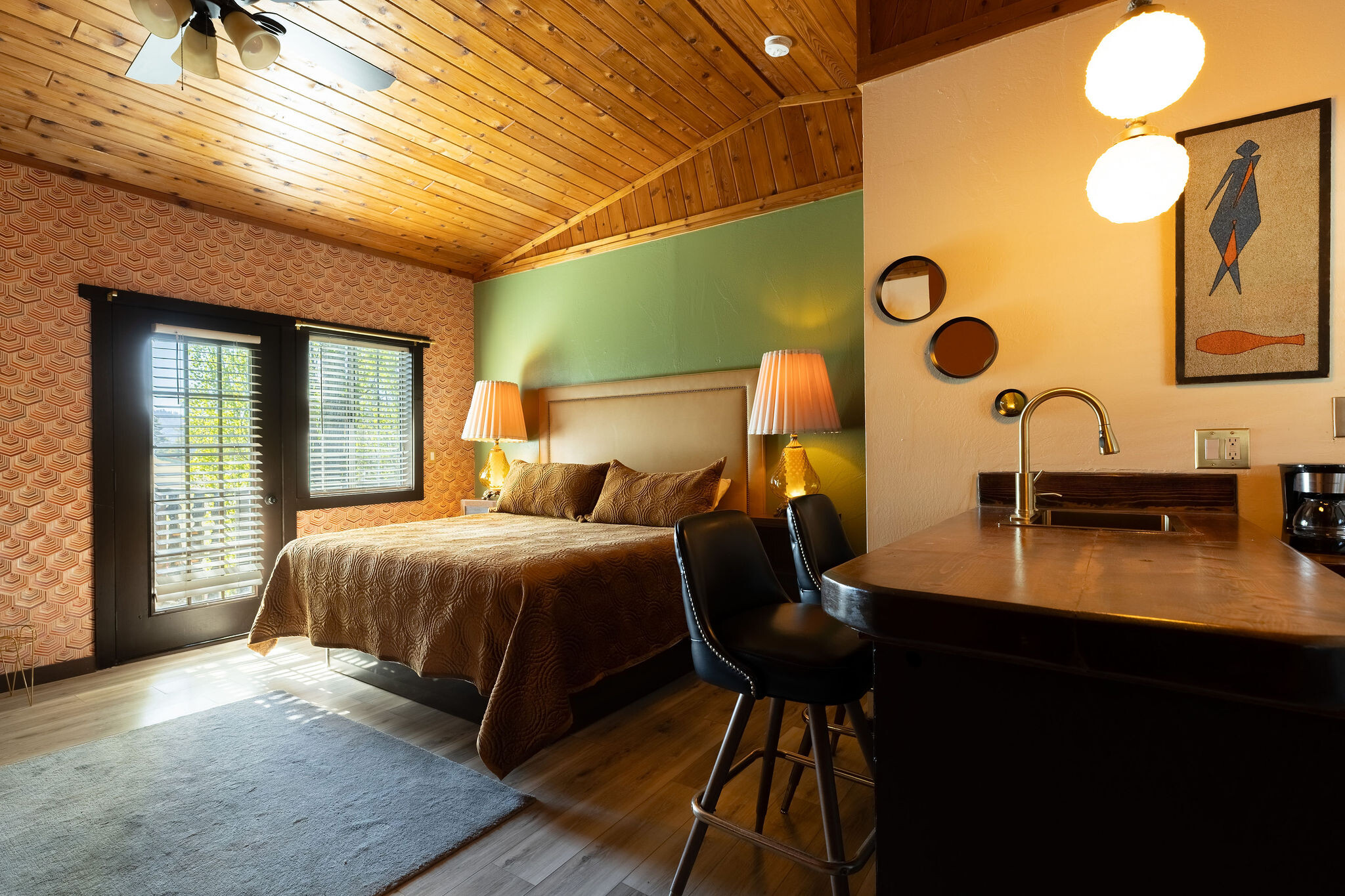 Log Cabin — pine paneling, vaulted arch, stone spa tub